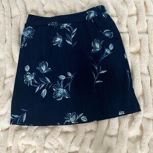 Navy blue linen mini skirt with floral details